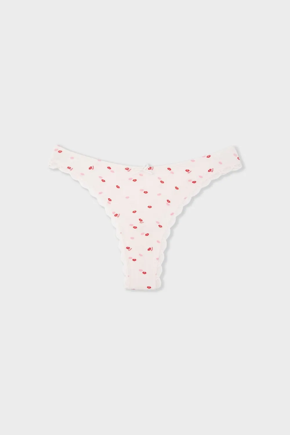 Online ETAM Tanga con motivos IMP FONDO ROSA
